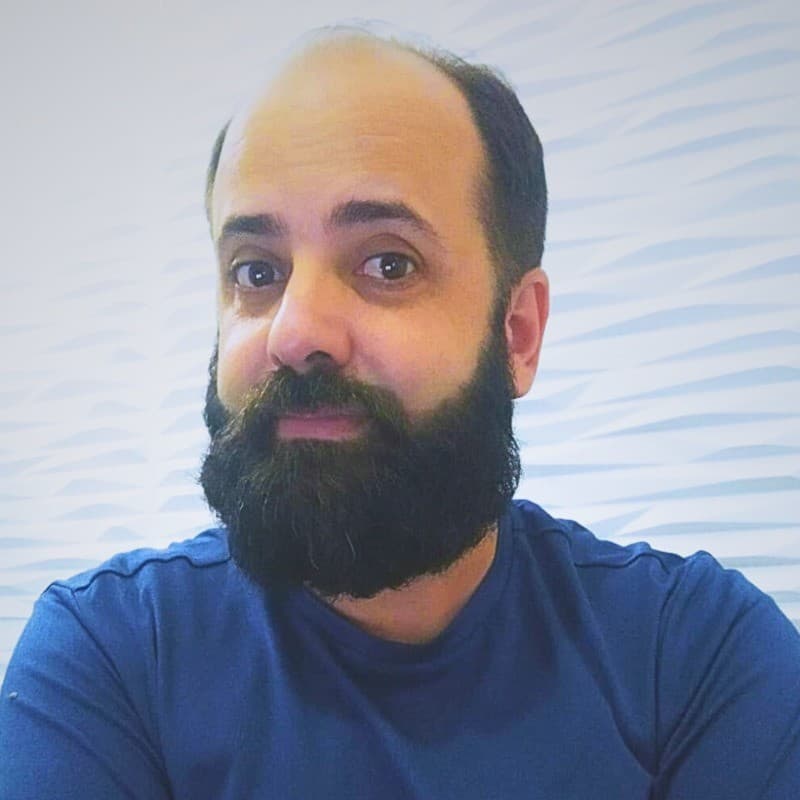 Professional headshot of Rodrigo Alexandre, Brazilian Mobile Developer specialized in React Native and AI